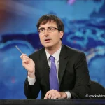 ohn Oliver speaking during a public television appearance